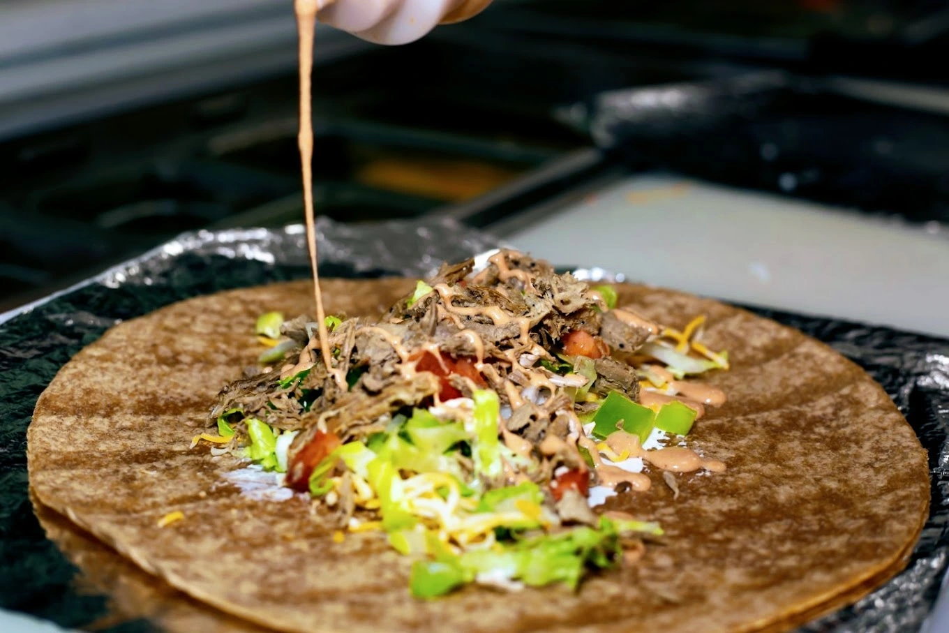 Delicious BBQ Ranch Steak Grilled Wrap at Hungry Birds in Edmonton